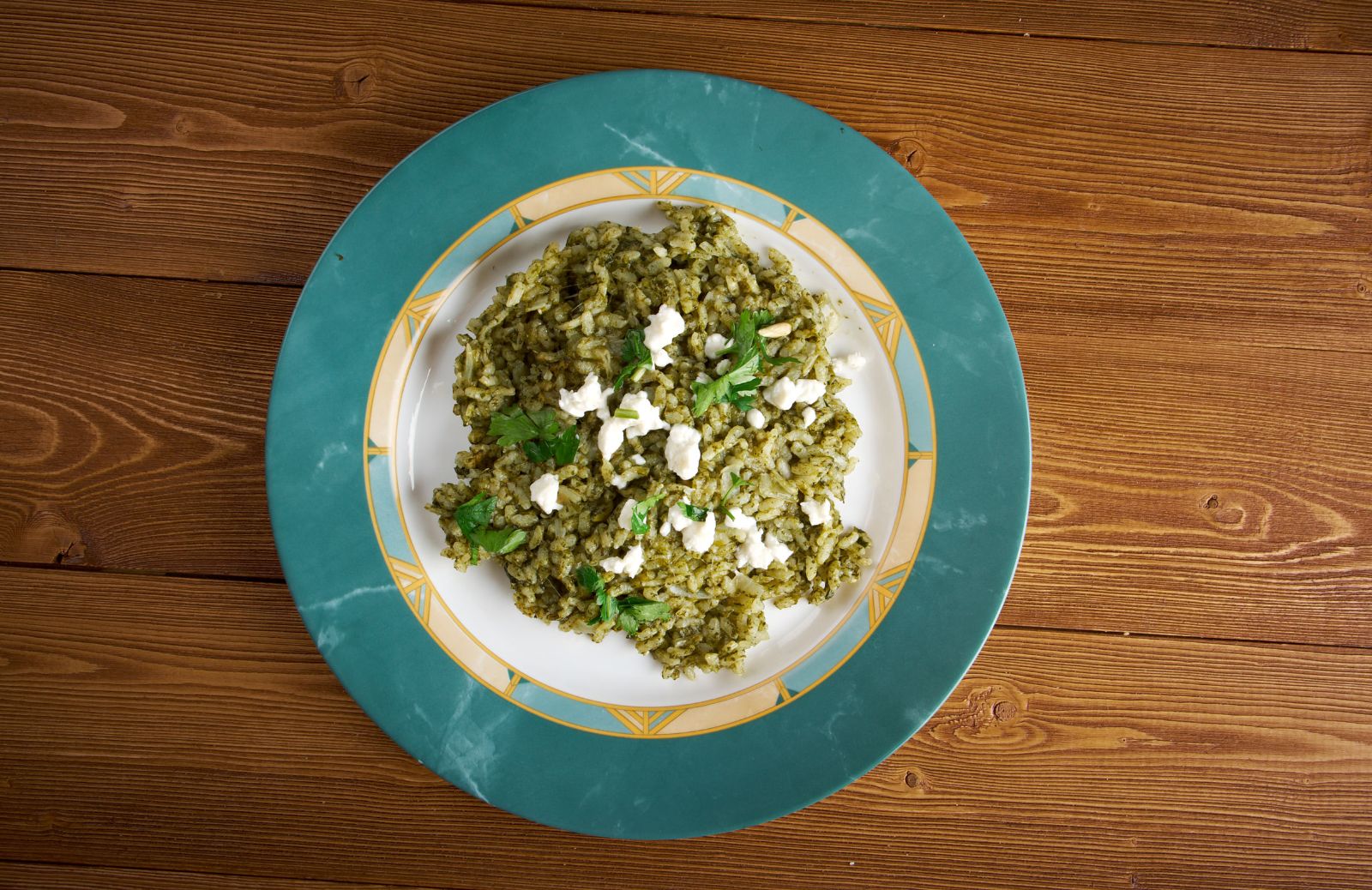 Riso con salsiccia e spinaci